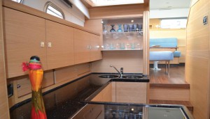 A 42 galley in American white oak, with custom stowages and an induction hob